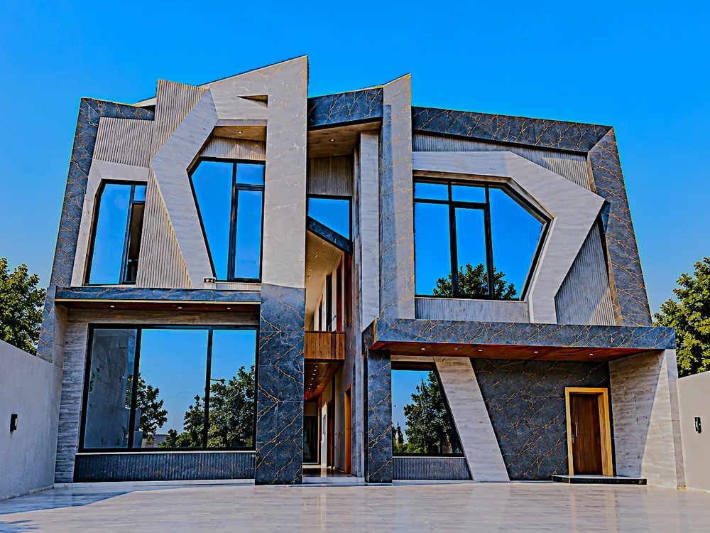 Finished modern home facade with custom-shaped aluminium windows