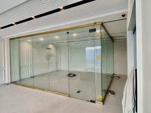 Gold frame office glass partition