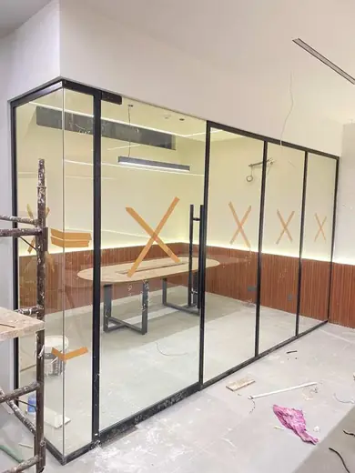Black frame conference room partition