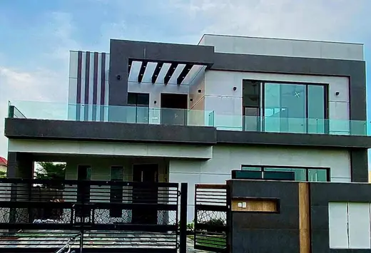 Modern house aluminium facade with glass railing