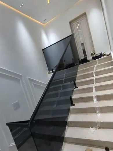 Black frame glass railing modern staircase