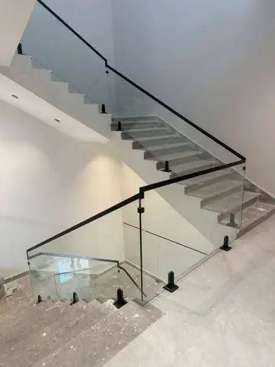 Black frame glass railing staircase