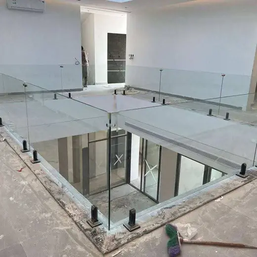Spider glass floor railing construction