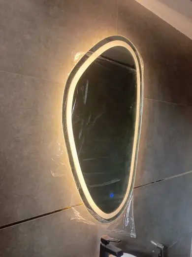 Asymmetric LED backlit mirror dark tiles