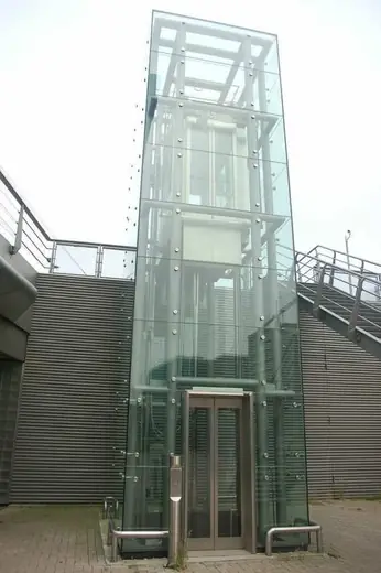 Spider fitting glass elevator shaft