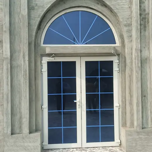 Aluminium arched entrance door blue glass