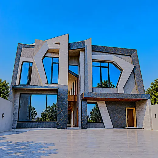 Finished modern home facade with custom-shaped aluminium windows