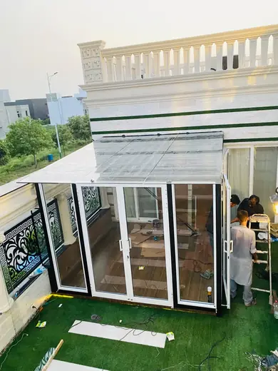 Terrace glass room with aluminium frames during installation